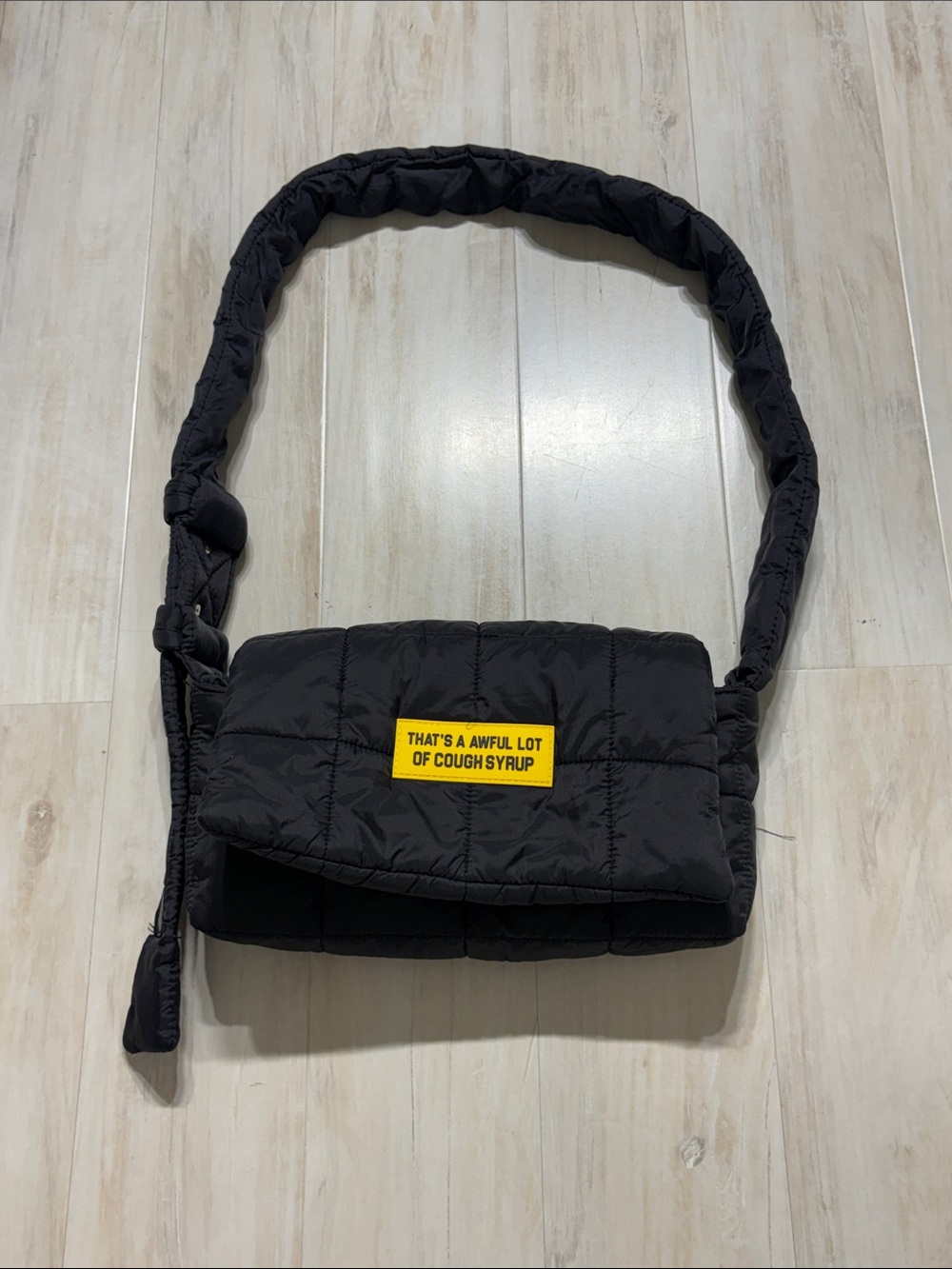 * Black Quilted Crossbody Bag with Yellow Statement Patch